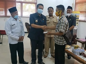 Wabup dan Baznas Salurkan Bantuan Bagi Korban Kebakaran